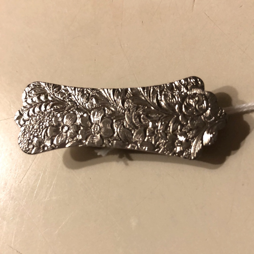 3/$25 Silver shoe clip or tie tack.